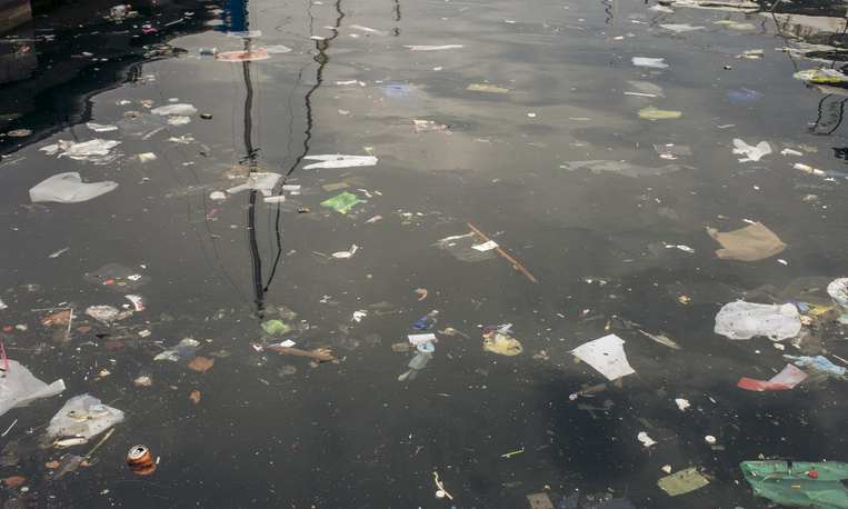garbage floating in water